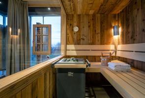 Finnische Sauna im Bergchalet Finnische Sauna im Bergchalet mit Ausblick in die Natur